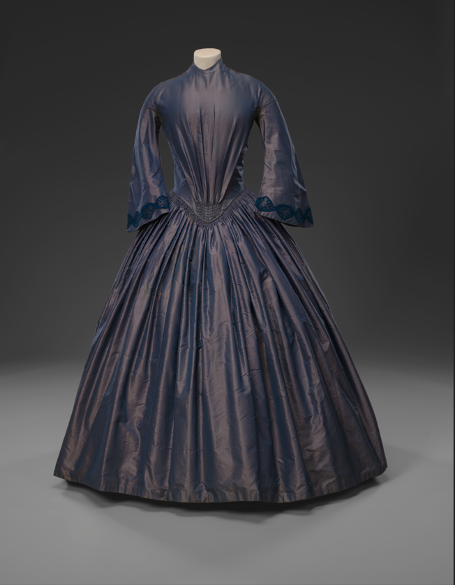 Blueish purple dress on dislplay from the 19th century 