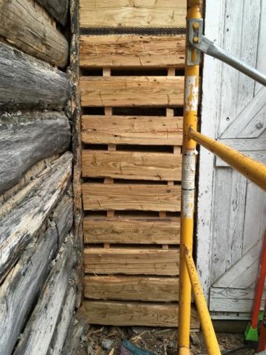 Replacement of the deteriorated tamarack logs built on Fort Winnebago Surgeons Quarters.